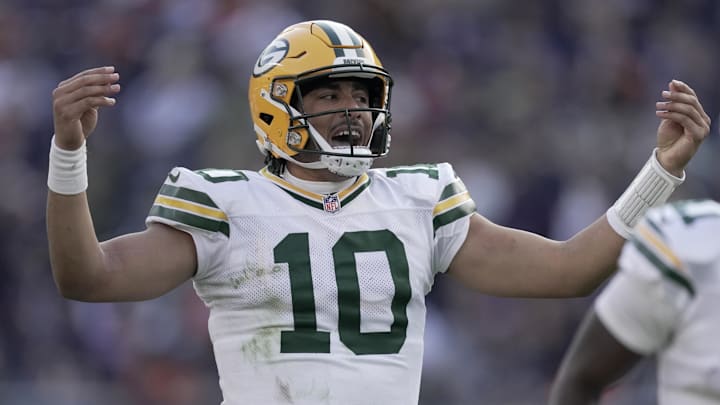 Nov 17, 2024; Chicago, Illinois, USA; Green Bay Packers quarterback Jordan Love (10) hurries his team downfield after throwing a 60-yard pass to wide receiver Christian Watson during the fourth quarter of their game Sunday, November 17, 2024 at Soldier Field in Chicago, Illinois. The Green Bay Packers beat the Chicago Bears 20-19. Mandatory Credit: Mark Hoffman/USA TODAY Network via Imagn Images 