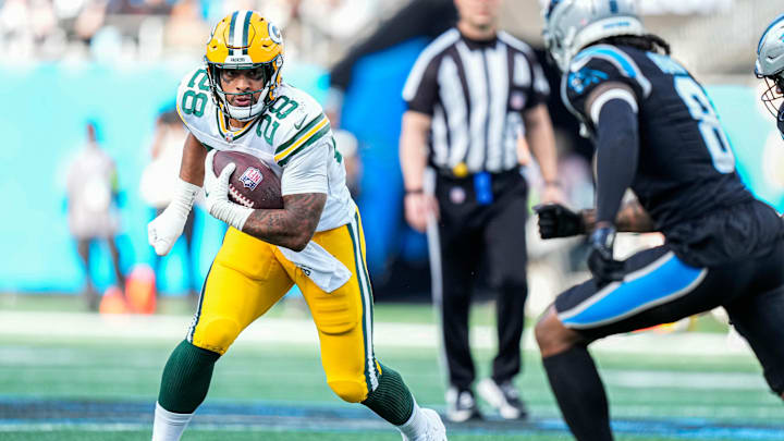 Dec 24, 2023; Charlotte, North Carolina, USA; Green Bay Packers running back AJ Dillon (28) against