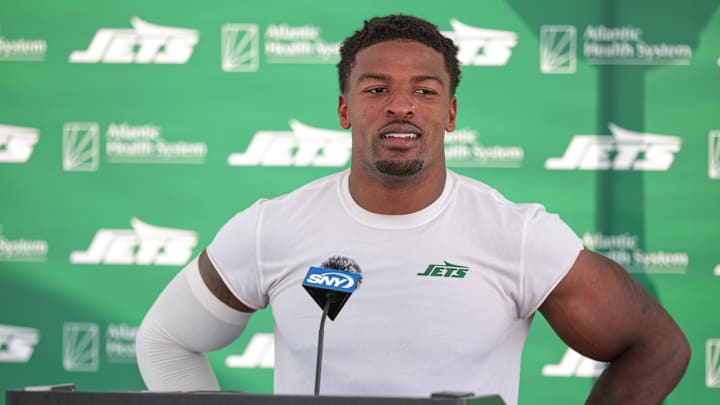 Jul 27, 2024; Florham Park, NJ, USA; New York Jets cornerback D.J. Reed (4) talks with media during training camp at Atlantic Health Jets Training Center. Jul 27, 2024; Florham Park, NJ, USA; New York Jets cornerback D.J. Reed (4) talks with media during training camp at Atlantic Health Jets Training Center.