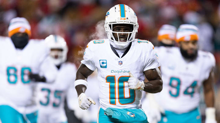 Tyreek Hill, shown here, runs on to the field before the start of a game