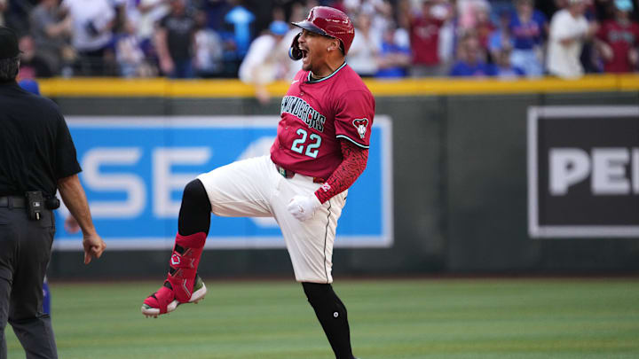 Arizona Diamondbacks Josh Naylor (22) celebrates his RBI double against the Chicago Cubs at Chase Field in Phoenix on Sunday, March 30, 2025.