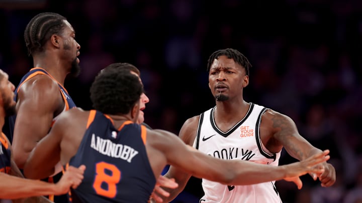 Nov 15, 2024; New York, New York, USA; New York Knicks forward OG Anunoby (8) is separated from Brooklyn Nets forward Dorian Finney-Smith (28) during the fourth quarter at Madison Square Garden. Mandatory Credit: Brad Penner-Imagn Images