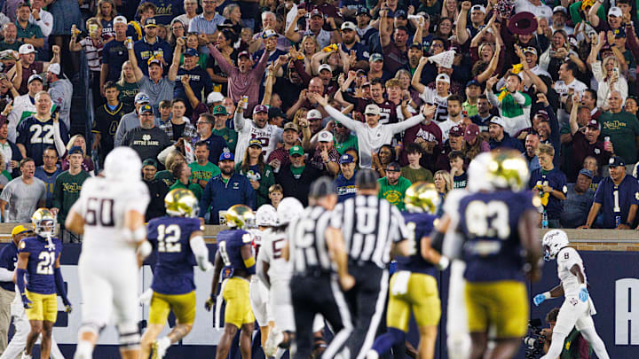 Texas A&M fans celebrates after a touchdown in the first half of a NCAA football game against Notre Dame at Notre Dame Stadium on Saturday, Sept. 13, 2025, in South Bend.