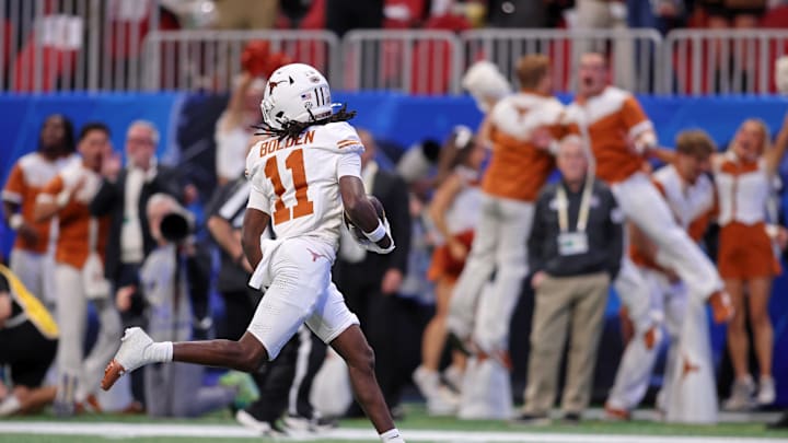 Jan 1, 2025; Atlanta, GA, USA; Texas Longhorns wide receiver Silas Bolden (11) returns a punt for a touchdown against the Arizona State Sun Devils during the first half of the Peach Bowl at Mercedes-Benz Stadium. Mandatory Credit: Brett Davis-Imagn Images