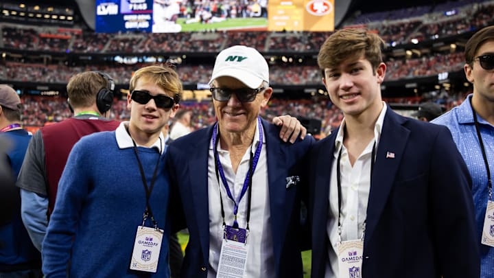 New York Jets owner Woody Johnson on the field with sons Jack Johnson (left) and Brick Johnson before Super Bowl LVIII between the San Francisco 49ers and the Kansas City Chiefs. New York Jets owner Woody Johnson on the field with sons Jack Johnson (left) and Brick Johnson before Super Bowl LVIII between the San Francisco 49ers and the Kansas City Chiefs.