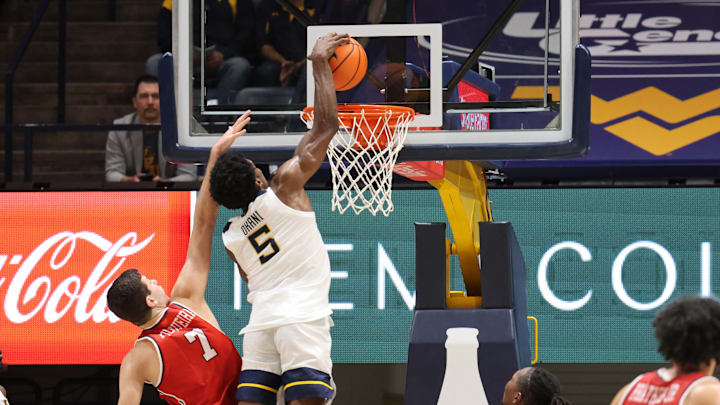 West Virginia University guard Toby Okani