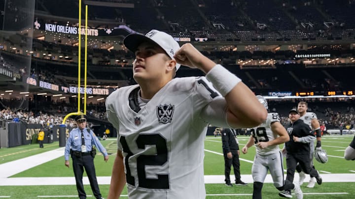 Dec 29, 2024; New Orleans, Louisiana, USA; Las Vegas Raiders quarterback Aidan O'Connell (12) pumps his fist after his team’s victory against the New Orleans Saints at Caesars Superdome. Mandatory Credit: Matthew Hinton-Imagn Images
