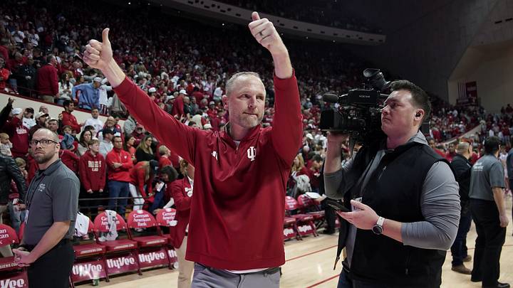 Feb 7, 2026; Bloomington, Indiana, USA; Indiana Hoosiers head coach Darian DeVries celebrates after the game against the Wisconsin Badgers at Simon Skjodt Assembly Hall. Mandatory Credit: Robert Goddin-Imagn Images