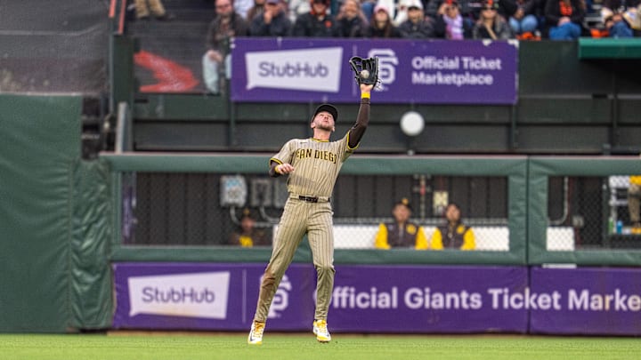 Aug 11, 2025; San Francisco, California, USA; San Diego Padres center fielder Jackson Merrill (3) fields a fly ball against the San Francisco Giants during the second inning at Oracle Park. Mandatory Credit: Neville E. Guard-Imagn Images