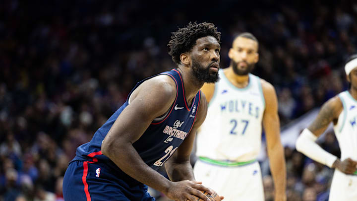 Joel Embiid shoots a free throw against the Timberwolves in 2023.