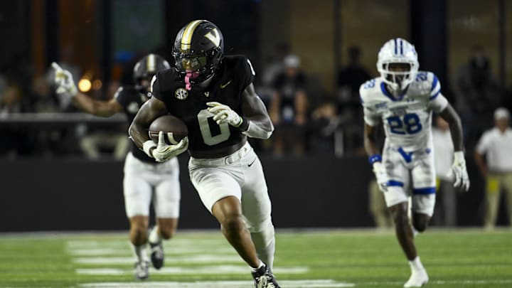 Sep 20, 2025; Nashville, Tennessee, USA;  Vanderbilt Commodores wide receiver Junior Sherrill (0) runs with the ball after a made catch against the Georgia State Panthers during the first half at FirstBank Stadium. Mandatory Credit: Steve Roberts-Imagn Images