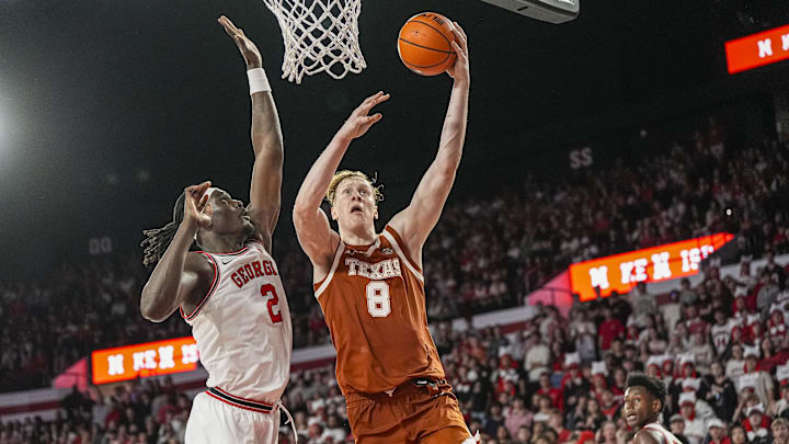 Feb 21, 2026; Athens, Georgia, USA; Texas Longhorns center Matas Vokietaitis (8) tries to score over Georgia Bulldogs center Somto Cyril (2) at Stegeman Coliseum. Mandatory Credit: Dale Zanine-Imagn Images Feb 21, 2026; Athens, Georgia, USA; Texas Longhorns center Matas Vokietaitis (8) tries to score over Georgia Bulldogs center Somto Cyril (2) at Stegeman Coliseum. Mandatory Credit: Dale Zanine-Imagn Images