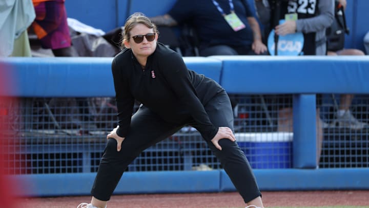 Stanford coach Jessica Allister watchs during a Women's College World Series semifinal softball game between the Stanford Cardinal and the Texas Longhorns at Devon Park in Oklahoma City, Monday, June 3, 2024. Texas won 1-0.