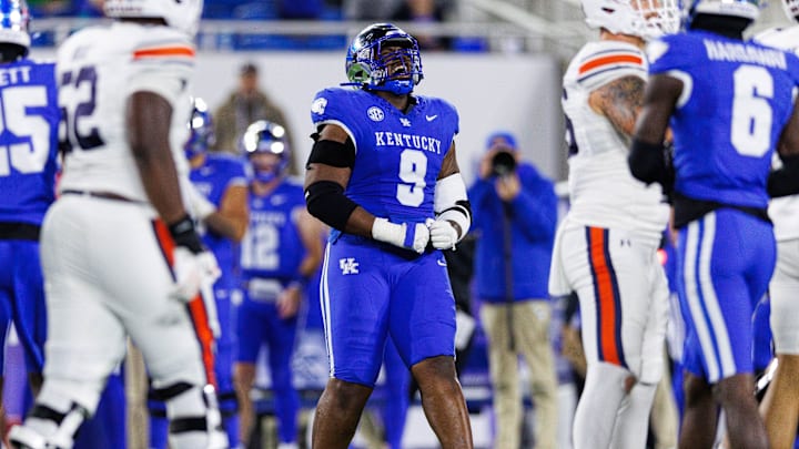 Oct 26, 2024; Lexington, Kentucky, USA; Kentucky Wildcats defensive lineman Keeshawn Silver (9) celebrates after a missed field goal by the Auburn Tigers during the third quarter at Kroger Field. Mandatory Credit: Jordan Prather-Imagn Images