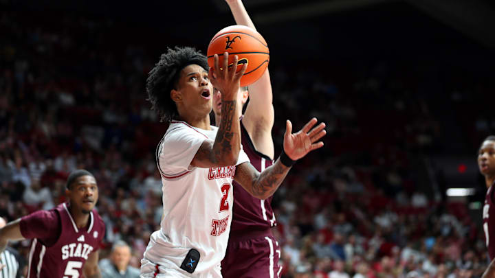 Feb 25, 2026; Tuscaloosa, Alabama, USA; Alabama Crimson Tide guard Aden Holloway (2) drives to the basket during the first half against the Mississippi State Bulldogs at Coleman Coliseum. 