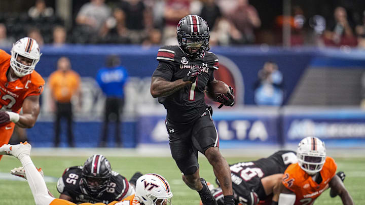 Aug 31, 2025; Atlanta, Georgia, USA; South Carolina Gamecocks running back Rahsul Faison (1) runs against the Virginia Tech Hokies during the first half at Mercedes-Benz Stadium. Mandatory Credit: Dale Zanine-Imagn Images