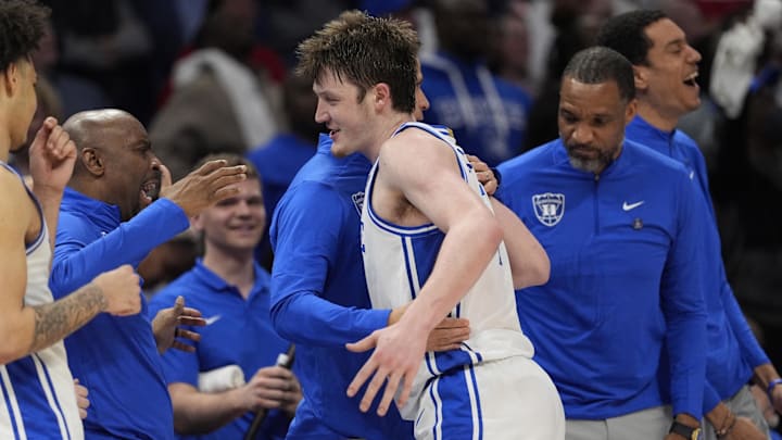 Mar 15, 2025; Charlotte, NC, USA; Duke Blue Devils guard Kon Knueppel (7) celebrates with teammates after winning the 2025 ACC Conference Championship game against the Louisville Cardinals at Spectrum Center. Mandatory Credit: Jim Dedmon-Imagn Images