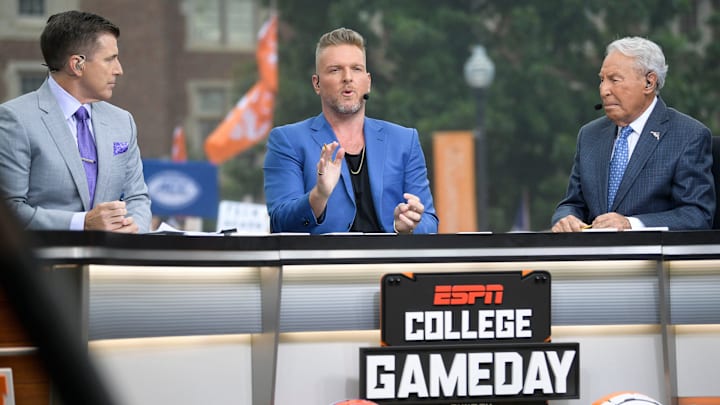 From left, Rece Davis, Pat McAfee and Lee Corso at the ESPN College GameDay stage outside of Ayres Hall on the University of Tennessee campus in Knoxville, Tenn. on Saturday, Sept. 24, 2022. The flagship ESPN college football pregame show returned for the tenth time to Knoxville as the No. 12 Vols hosted the No. 22 Gators.

Kns Espn College Gameday