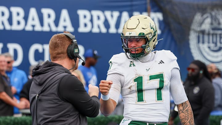 Former South Florida quarterback Byrum Brown is following his head coach Alex Golesh, left, to Auburn.