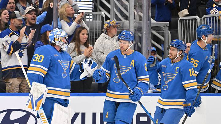 Oct 20, 2026; St. Louis, Missouri, USA; St. Louis Blues defenseman Philip Broberg (6) is congratulated by goaltender Joel Hofer (30) and center Robert Thomas (18) after scoring against the Winnipeg Jets during the third period at Enterprise Center. Mandatory Credit: Jeff Le-Imagn Images Oct 20, 2026; St. Louis, Missouri, USA; St. Louis Blues defenseman Philip Broberg (6) is congratulated by goaltender Joel Hofer (30) and center Robert Thomas (18) after scoring against the Winnipeg Jets during the third period at Enterprise Center. Mandatory Credit: Jeff Le-Imagn Images