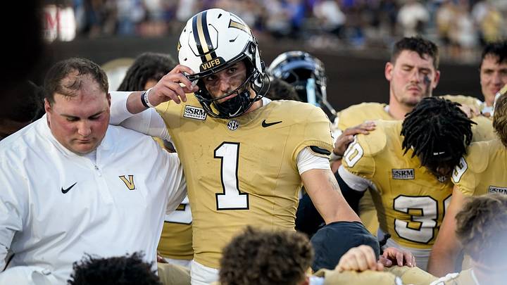 Vanderbilt quarterback Blaze Berlowitz (1) huddles with his team after defeating Delaware at FirstBank Stadium in Nashville, Tenn., Saturday, Sept. 12, 2026.