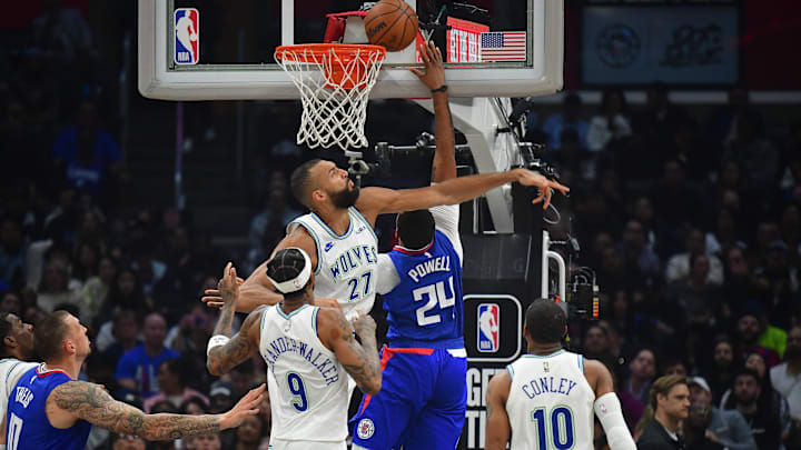 Los Angeles Clippers guard Norman Powell (24) moves to the basket against Minnesota Timberwolves center Rudy Gobert (27) during the first half at Crypto.com Arena. Los Angeles Clippers guard Norman Powell (24) moves to the basket against Minnesota Timberwolves center Rudy Gobert (27) during the first half at Crypto.com Arena.