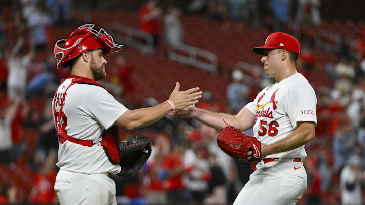 Jul 8, 2025; St. Louis, Missouri, USA;  St. Louis Cardinals relief pitcher Ryan Helsley (56) and catcher Pedro Pages (43) celebrate after the Cardinals defeated the Washington Nationals at Busch Stadium. Mandatory Credit: Jeff Curry-Imagn Images