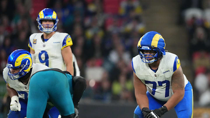 Oct 19, 2025; London, United Kingdom; Los Angeles Rams offensive tackle Alaric Jackson (77) before a snap against the Jacksonville Jaguars during the second half of an NFL International Series game at Wembley Stadium. Mandatory Credit: Kirby Lee-Imagn Images Oct 19, 2025; London, United Kingdom; Los Angeles Rams offensive tackle Alaric Jackson (77) before a snap against the Jacksonville Jaguars during the second half of an NFL International Series game at Wembley Stadium. Mandatory Credit: Kirby Lee-Imagn Images