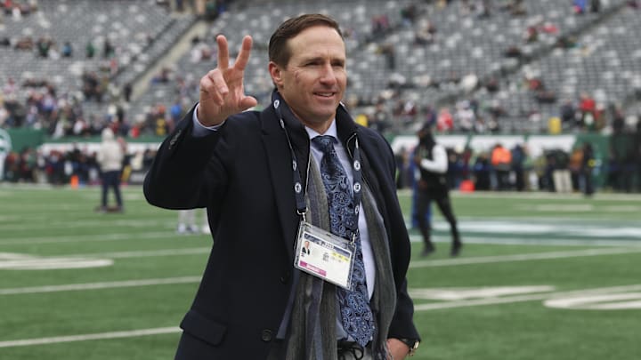 Dec 28, 2025; East Rutherford, New Jersey, USA; Former NFL player Drew Brees on the field prior to the game between the New England Patriots and New York Jets at MetLife Stadium. Mandatory Credit: Vincent Carchietta-Imagn Images