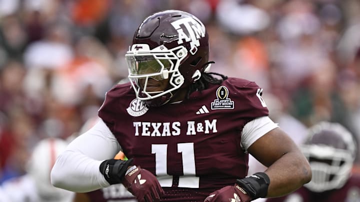 Dec 20, 2025; College Station, TX, USA; Texas A&M Aggies defensive tackle Tyler Onyedim (11) celebrates a sack during first half of the first round game of the CFP National Playoff against the Miami Hurricanes at Kyle Field. Mandatory Credit: Jerome Miron-Imagn Images