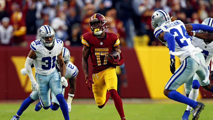 Nov 24, 2024; Landover, Maryland, USA; Washington Commanders wide receiver Terry McLaurin (17) runs for a touchdown against Dallas Cowboys cornerback Josh Butler (31) during the fourth quarter at Northwest Stadium. Mandatory Credit: Peter Casey-Imagn Images Nov 24, 2024; Landover, Maryland, USA; Washington Commanders wide receiver Terry McLaurin (17) runs for a touchdown against Dallas Cowboys cornerback Josh Butler (31) during the fourth quarter at Northwest Stadium. Mandatory Credit: Peter Casey-Imagn Images