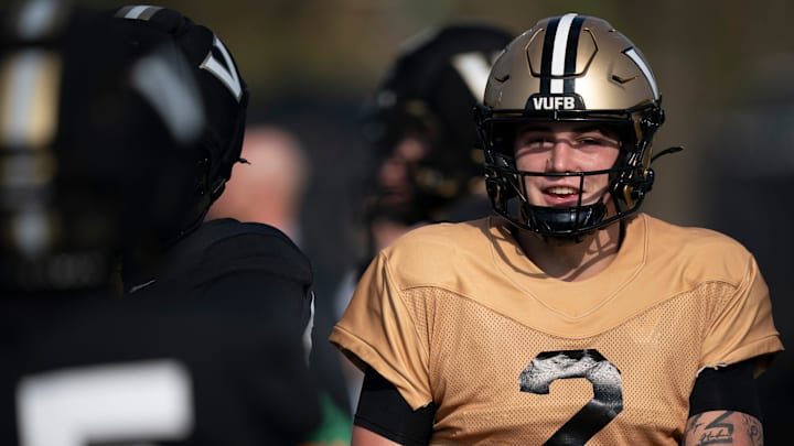 Vanderbilt University freshman quarterback Jared Curtis (2) talks with wide receiver Joseph McVay in practice at Vanderbilt University’s McGugin Center practice fields Tuesday, March 31, 2026.