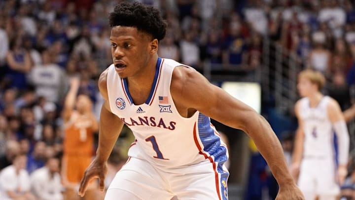 Kansas junior guard Joseph Yesufu (1) watches the ball after a possession change