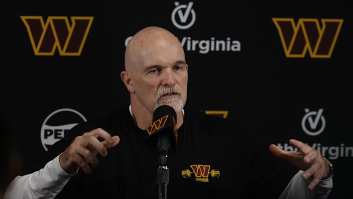 Washington Commanders head coach Dan Quinn speaks with the media.