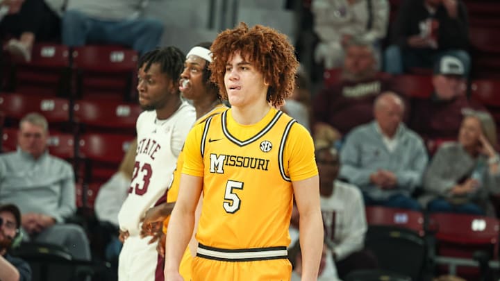 Feb 1, 2025; Starkville, Mississippi, USA; Missouri Tigers guard T.O. Barrett (5) looks on against the Mississippi State Bulldogs during the second half at Humphrey Coliseum. Mandatory Credit: Wesley Hale-Imagn Images