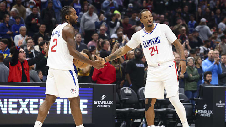 Dec 14, 2023; Los Angeles, California, USA; LA Clippers forward Kawhi Leonard (2) and guard Norman Powell (24) celebrate after defeating the Golden State Warriors during a game at Crypto.com Arena. Mandatory Credit: Jessica Alcheh-Imagn Images