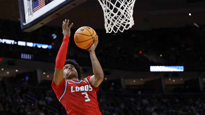 Mar 23, 2025; Cleveland, OH, USA; New Mexico Lobos guard Tru Washington (3) shoots the ball in the second half against the Michigan State Spartans during the NCAA Tournament Second Round at Rocket Arena. Mandatory Credit: Rick Osentoski-Imagn Images