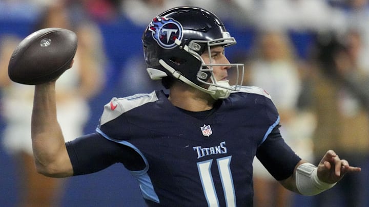 Dec 22, 2024; Indianapolis, Indiana, USA; Tennessee Titans quarterback Mason Rudolph (11) draws back to pass during a game against the Indianapolis Colts at Lucas Oil Stadium at Lucas Oil Stadium. Mandatory Credit: Christine Tannous/USA Today Network via Imagn Images 