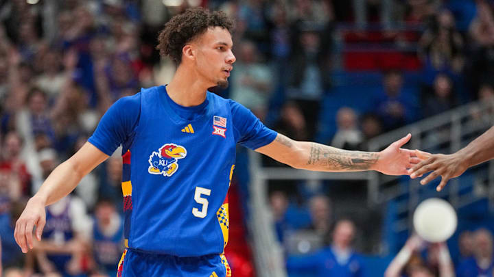 Feb 11, 2025; Lawrence, Kansas, USA; Kansas Jayhawks guard Zeke Mayo (5) celebrates after a score against the Colorado Buffaloes during the second half at Allen Fieldhouse.