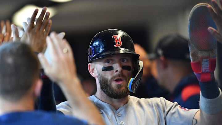 May 28, 2025; Milwaukee, Wisconsin, USA; Boston Red Sox shortstop Trevor Story (10) celebrates in the dugout with teammates during a game against the Milwaukee Brewers at American Family Field. Mandatory Credit: Patrick Gorski-Imagn Images