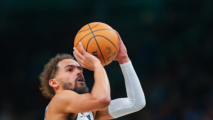Dec 23, 2024; Atlanta, Georgia, USA; Atlanta Hawks guard Trae Young (11) shoots a free throw against the Minnesota Timberwolves in the second quarter at State Farm Arena. Mandatory Credit: Brett Davis-Imagn Images
