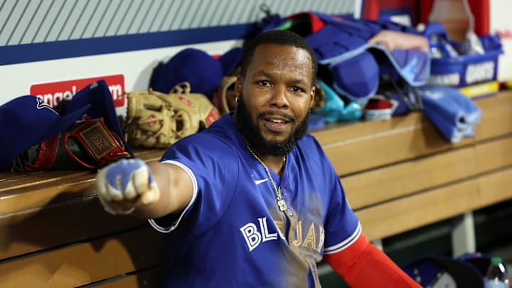 May 7, 2025; Anaheim, California, USA;  Toronto Blue Jays first baseman Vladimir Guerrero Jr. (27) reacts in the dugout after scoring a run during the sixth inning against the Los Angeles Angels at Angel Stadium. 