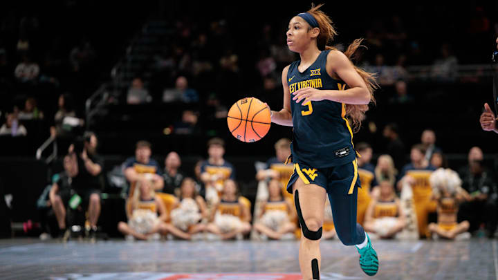 Mar 8, 2026; Kansas City, MO, USA; West Virginia Mountaineers guard Gia Cooke (3) brings the ball up court during the first half against the TCU Horned Frogs at T-Mobile Center. Mandatory Credit: William Purnell-Imagn Images Mar 8, 2026; Kansas City, MO, USA; West Virginia Mountaineers guard Gia Cooke (3) brings the ball up court during the first half against the TCU Horned Frogs at T-Mobile Center. Mandatory Credit: William Purnell-Imagn Images