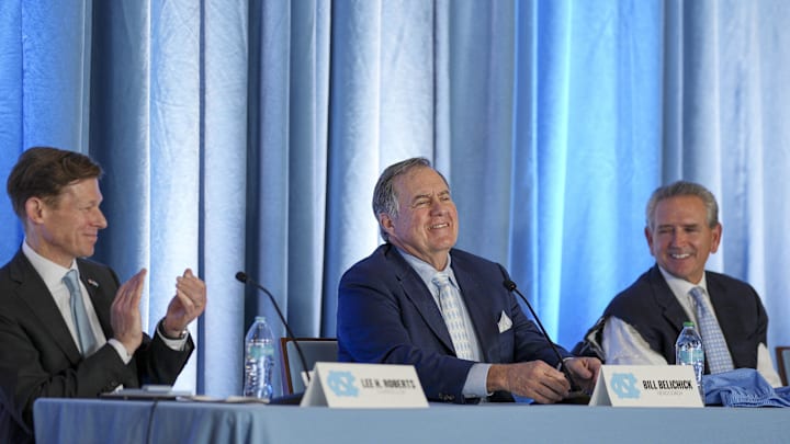 Dec 12, 2024; Chapel Hill, NC, USA; North Carolina Tar Heels chancellor Lee Roberts, new head coach Bill Belichick and athletic director Bubba Cunningham at Loudermilk Center for Excellence. Dec 12, 2024; Chapel Hill, NC, USA; North Carolina Tar Heels chancellor Lee Roberts, new head coach Bill Belichick and athletic director Bubba Cunningham at Loudermilk Center for Excellence.