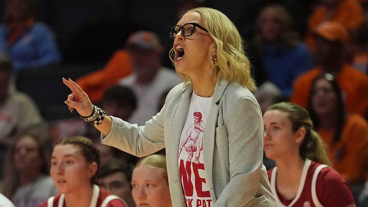 Arkansas basketball coach Kelsi Musick yells instructions to her players during an NCAA college basketball game against Tennessee on January 11, 2026, in Knoxville, Tennessee. Arkansas basketball coach Kelsi Musick yells instructions to her players during an NCAA college basketball game against Tennessee on January 11, 2026, in Knoxville, Tennessee.