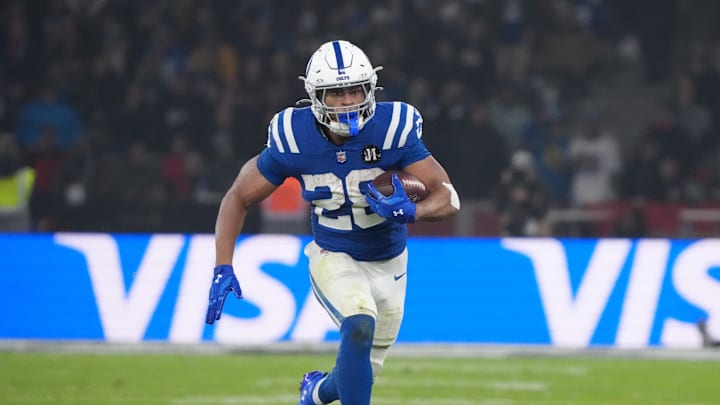 Nov 9, 2025; Berlin, Germany; Indianapolis Colts running back Jonathan Taylor (28) runs the ball against the Atlanta Falcons during the NFL Berlin Game at Olympic Stadium. Mandatory Credit: Kirby Lee-Imagn Images