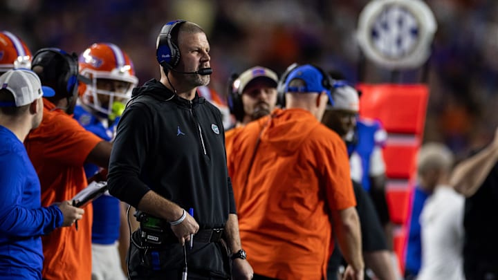 Oct 19, 2024; Gainesville, Florida, USA; Florida Gators head coach Billy Napier calls a play against the Kentucky Wildcats during the second half at Ben Hill Griffin Stadium. Mandatory Credit: Matt Pendleton-Imagn Images
