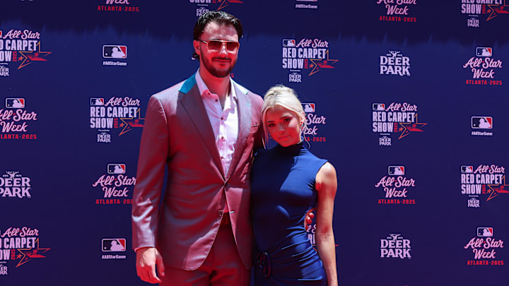 Jul 15, 2025; Atlanta, GA, USA; National League pitcher Paul Skenes (30) of the Pittsburgh Pirates and social media influencer Livvy Dunne pose for a photo on the red carpet before the 2025 MLB All Star Game at Truist Park. Mandatory Credit: Brett Davis-Imagn Images Jul 15, 2025; Atlanta, GA, USA; National League pitcher Paul Skenes (30) of the Pittsburgh Pirates and social media influencer Livvy Dunne pose for a photo on the red carpet before the 2025 MLB All Star Game at Truist Park. Mandatory Credit: Brett Davis-Imagn Images