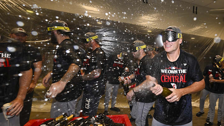 Sep 21, 2024; St. Louis, Missouri, USA;  The Cleveland Guardians spray champagne in the locker room after the Guardians clinched the AL central division title after a game against the St. Louis Cardinals at Busch Stadium. Mandatory Credit: Jeff Curry-Imagn Images