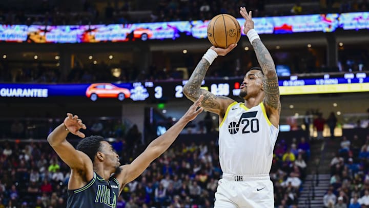 Nov 25, 2023; Salt Lake City, Utah, USA; Utah Jazz forward/center John Collins (20) shoots the ball against New Orleans Pelicans forward Herbert Jones (5) during the first half at Delta Center. Mandatory Credit: Christopher Creveling-Imagn Images Nov 25, 2023; Salt Lake City, Utah, USA; Utah Jazz forward/center John Collins (20) shoots the ball against New Orleans Pelicans forward Herbert Jones (5) during the first half at Delta Center. Mandatory Credit: Christopher Creveling-Imagn Images